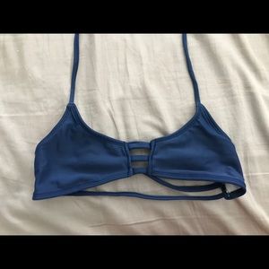 Midori three straps on the back and a tie neck